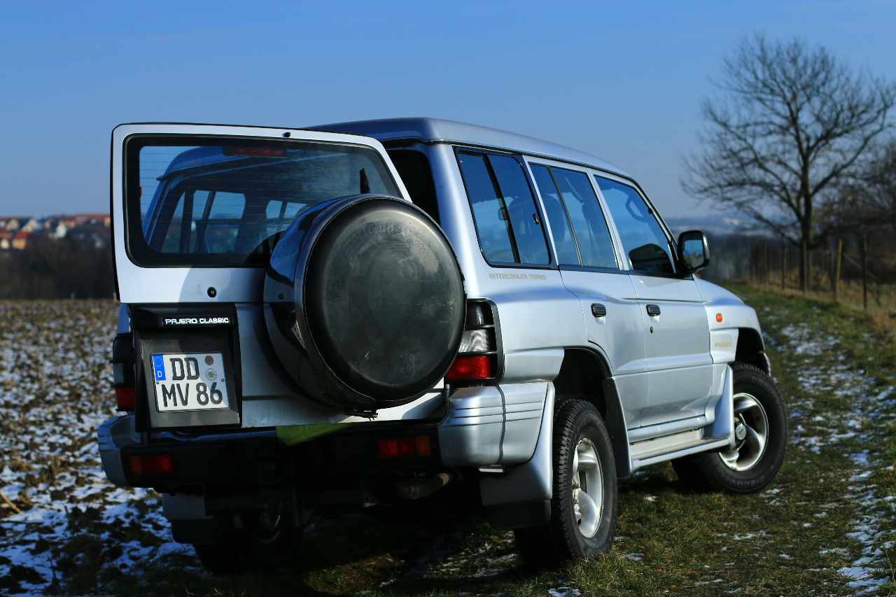 The Pajero on a field in Dresden from behind